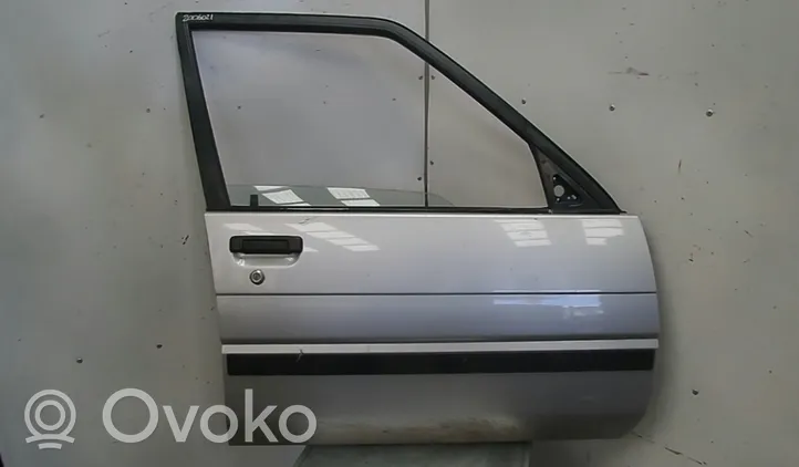 Toyota Corolla E80 Drzwi przednie 