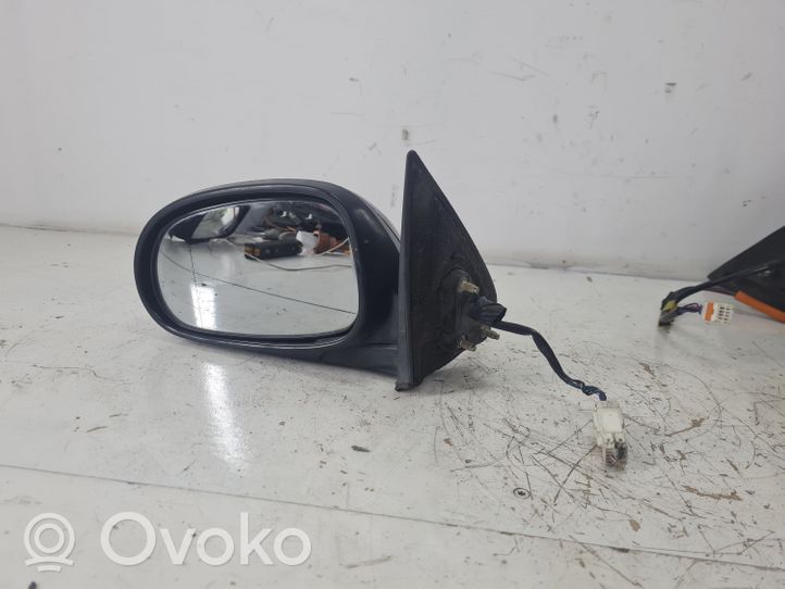 Nissan Maxima Elektryczne lusterko boczne drzwi przednich 010410