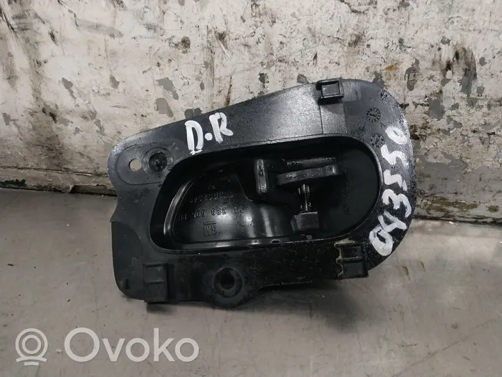 Opel Combo B Klamka wewnętrzna drzwi przednich 90388606RH