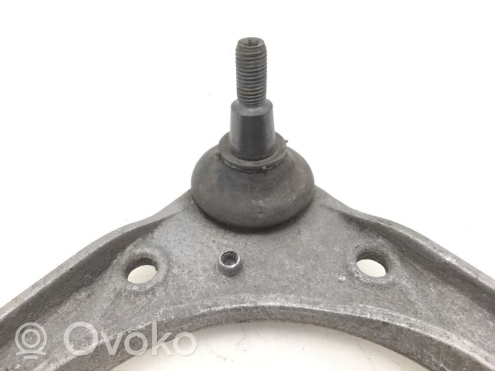 Volkswagen Touareg I Fourchette, bras de suspension inférieur avant 7L0407047A