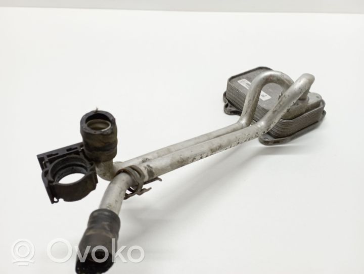 Volkswagen Jetta V Supporto di montaggio del filtro dell’olio 03C117021J