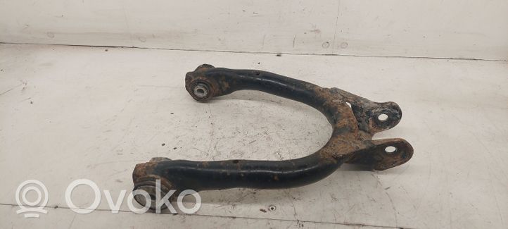 Volkswagen PASSAT B5.5 Braccio di controllo sospensione posteriore superiore/braccio oscillante 8E0505323D