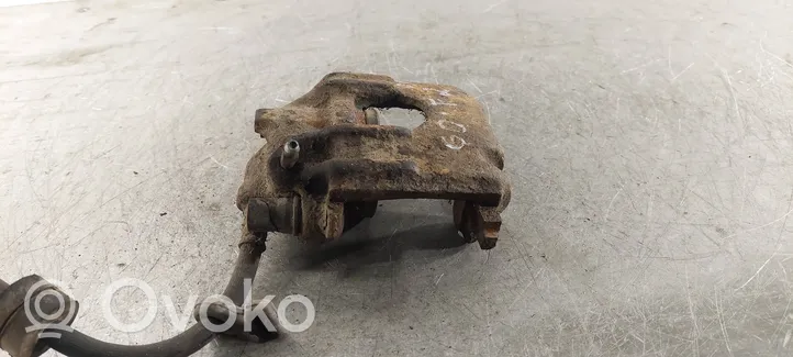 Volkswagen Golf II Front brake caliper 