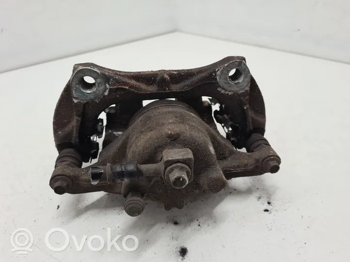 Opel Astra J Caliper de freno delantero 