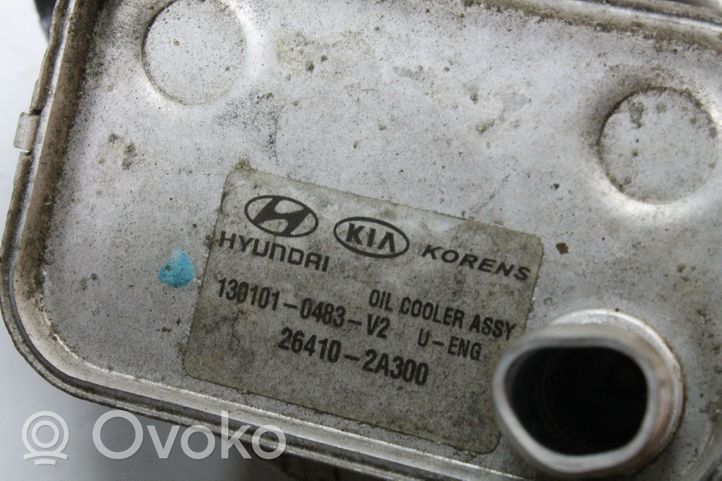 KIA Ceed Engine oil radiator 264102A300