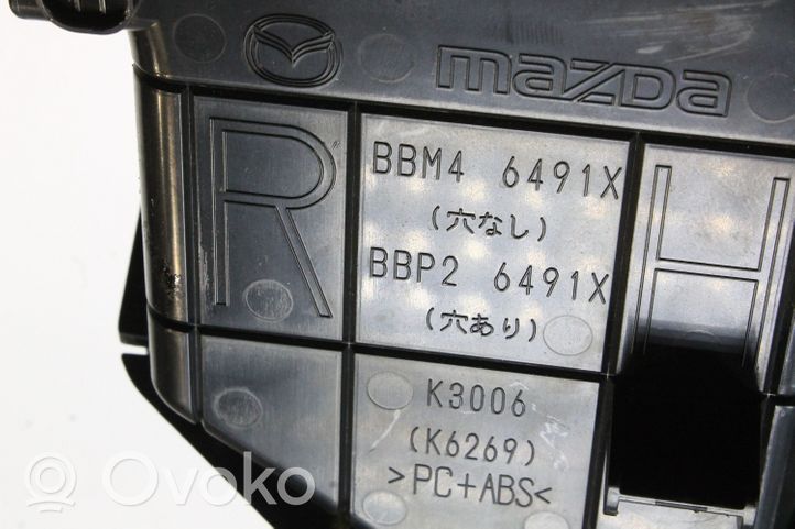 Mazda 3 II Kojelaudan tuuletussuuttimen suojalista BBM46491X
