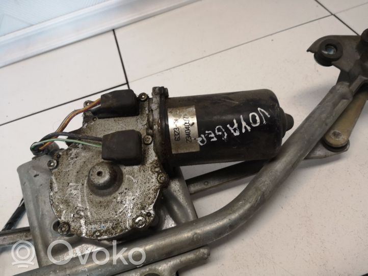 Chrysler Voyager Motor y varillaje del limpiaparabrisas delantero 23404097