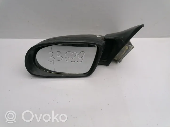 Opel Omega B1 Front door electric wing mirror E010357