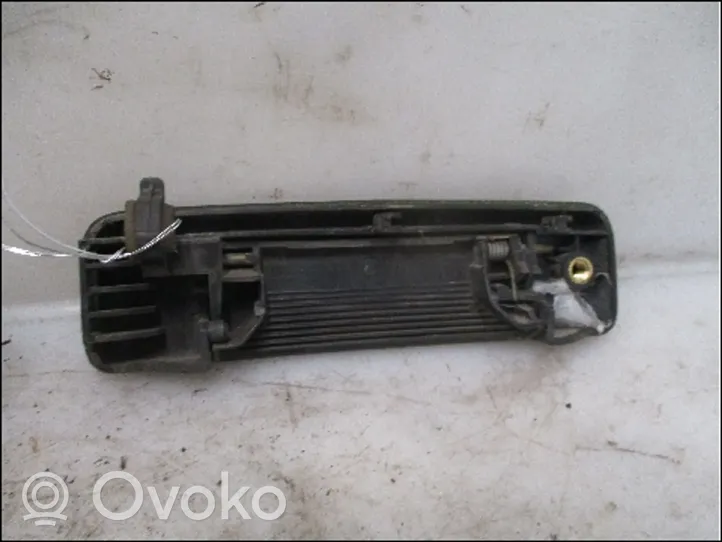 Renault 19 Klamka zewnętrzna drzwi przednich 7700793252