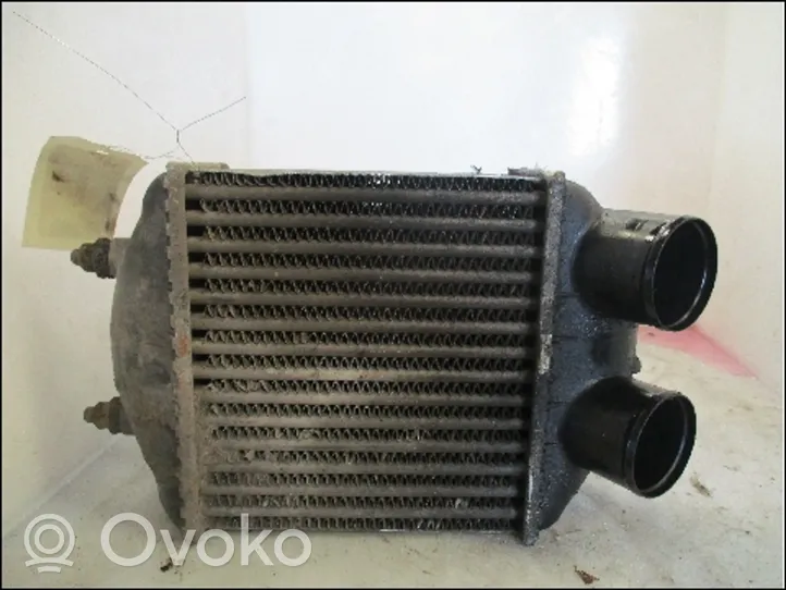 Renault 21 Chłodnica powietrza doładowującego / Intercooler 7700775150