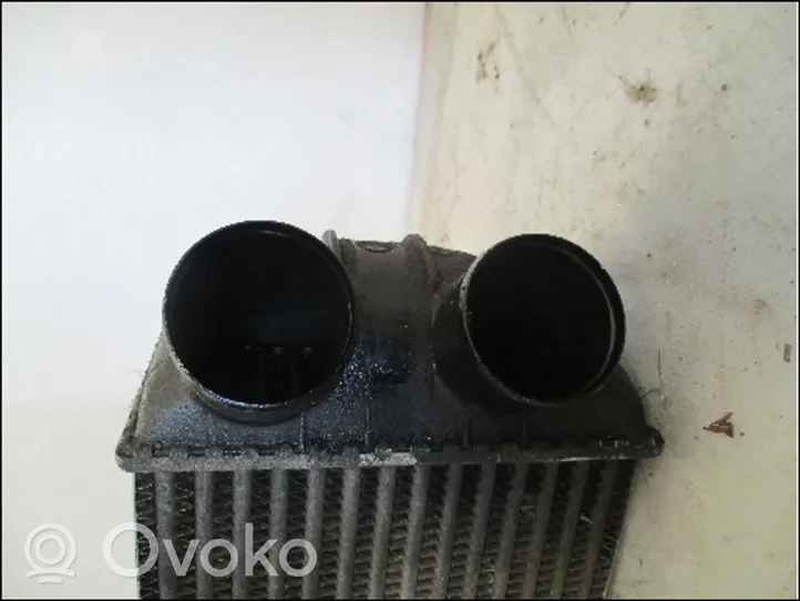 Renault 21 Chłodnica powietrza doładowującego / Intercooler 7700775150