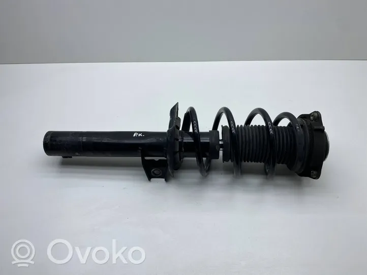 Volkswagen PASSAT CC Front shock absorber with coil spring 335576