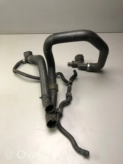 Volkswagen Jetta USA Tubo flessibile del liquido di raffreddamento del motore 5QM121049E