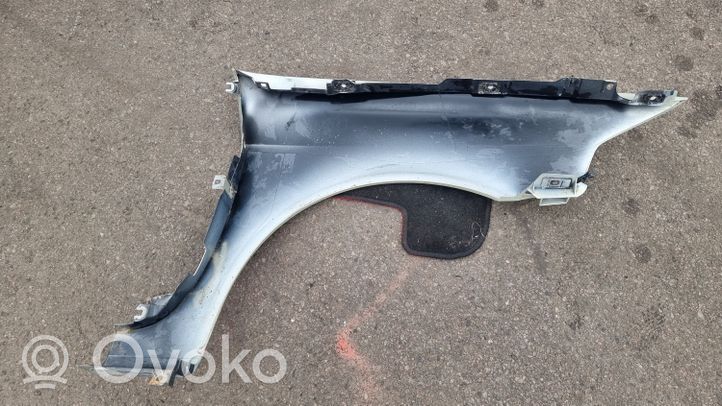 Renault Laguna II Błotnik przedni 8200129520