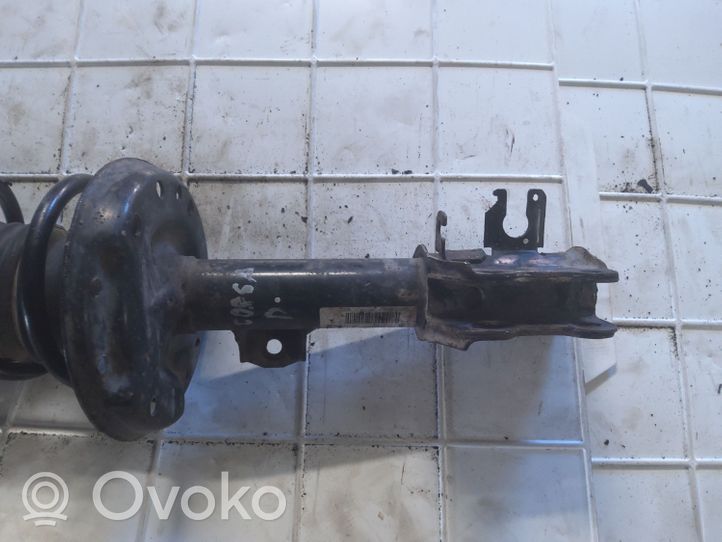 Opel Corsa D Front shock absorber with coil spring 13214354