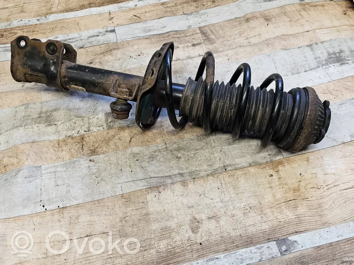 Opel Astra H Front shock absorber with coil spring 22214597
