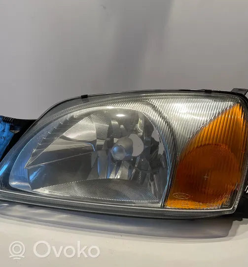 Ford Fiesta Lampa przednia 0301173303