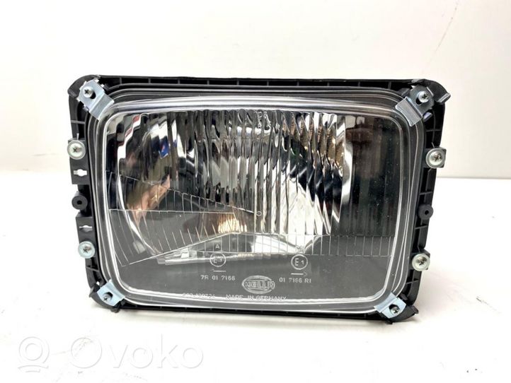 Mercedes-Benz 207 310 Lampa przednia A0008209661