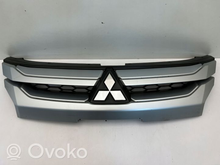 Mitsubishi L200 Maskownica / Grill / Atrapa górna chłodnicy 7450B292