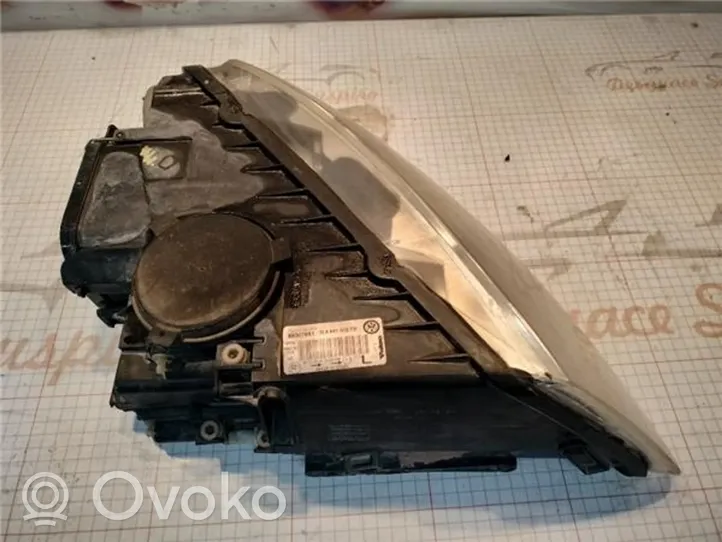 Volkswagen Touareg I Lampa przednia 7l6941015cf