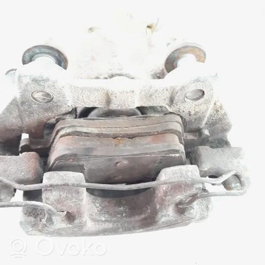 Volkswagen PASSAT Front brake caliper 11819000671