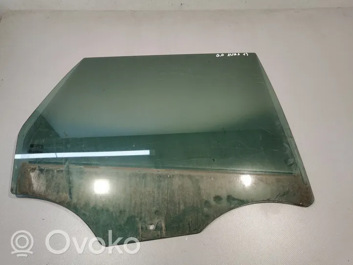 Opel Astra J Rear door window glass 