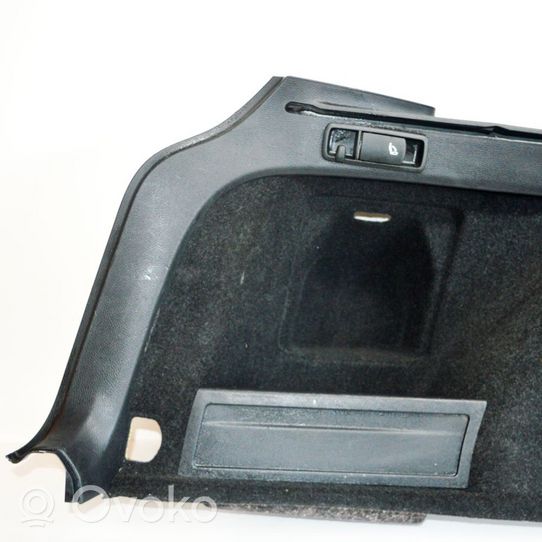 Volkswagen PASSAT B7 Garniture panneau latérale du coffre 