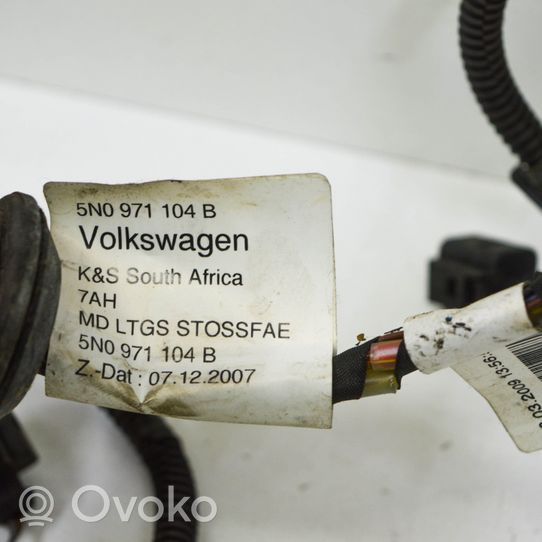 Volkswagen Tiguan Parkavimo (PDC) daviklių instaliacija 5N0971104B
