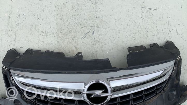 Opel Corsa D Front bumper upper radiator grill 13286000