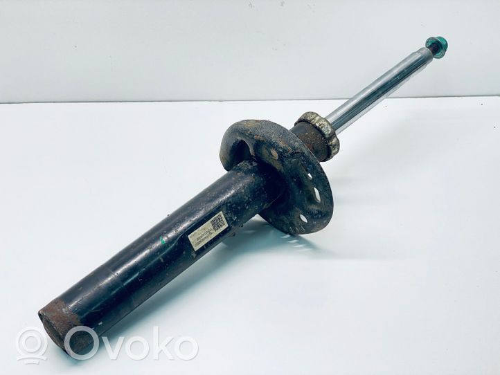 Volkswagen Eos Front shock absorber/damper 1T0413031HM