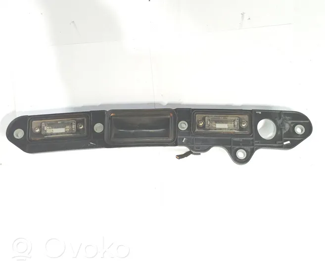 Volkswagen Touran I Trunk door license plate light bar 1T0827574H