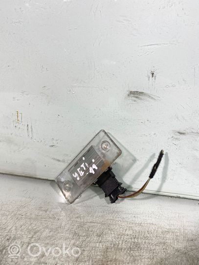 Skoda Yeti (5L) Lampa oświetlenia tylnej tablicy rejestracyjnej 6y0943021e