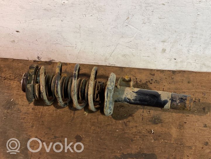 Volkswagen Tiguan Front shock absorber with coil spring 