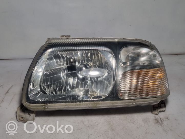 Suzuki Grand Vitara I Phare frontale 10032078