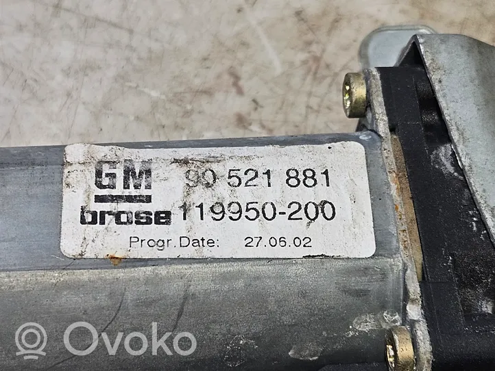 Opel Astra G Elektryczny podnośnik szyby drzwi 90521881