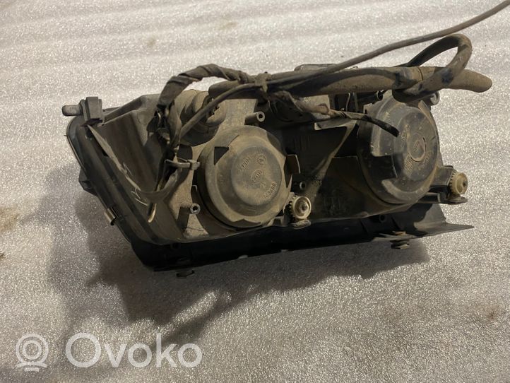 Volkswagen PASSAT B5 Lampa przednia 14869100