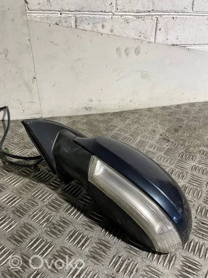 Volkswagen PASSAT B6 Front door electric wing mirror E1010781