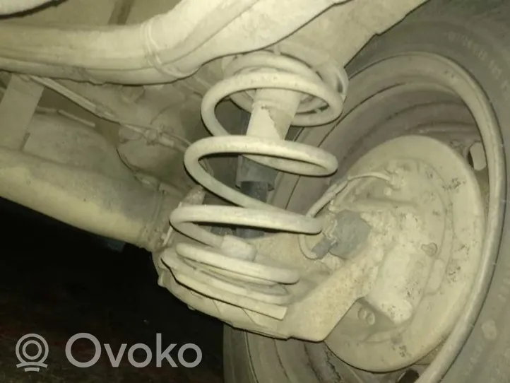 Opel Astra G Amortiguador trasero con muelle espiral 