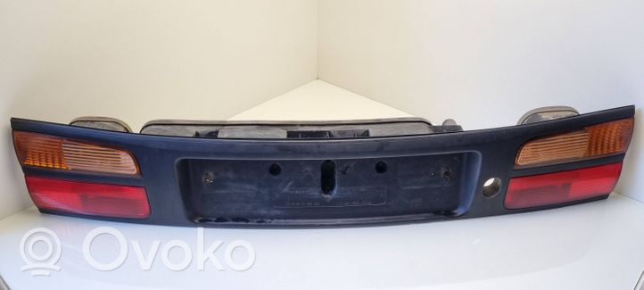 Renault Laguna I Listwa oświetlenie tylnej tablicy rejestracyjnej 7700420119