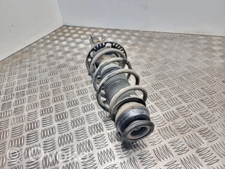 Volkswagen Cross Polo Front shock absorber with coil spring 6r0413031