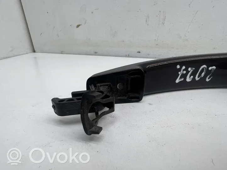 Opel Astra J Front door exterior handle 13500026