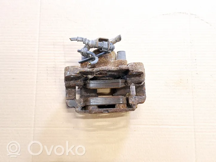 Volkswagen Touareg I Rear brake caliper 0