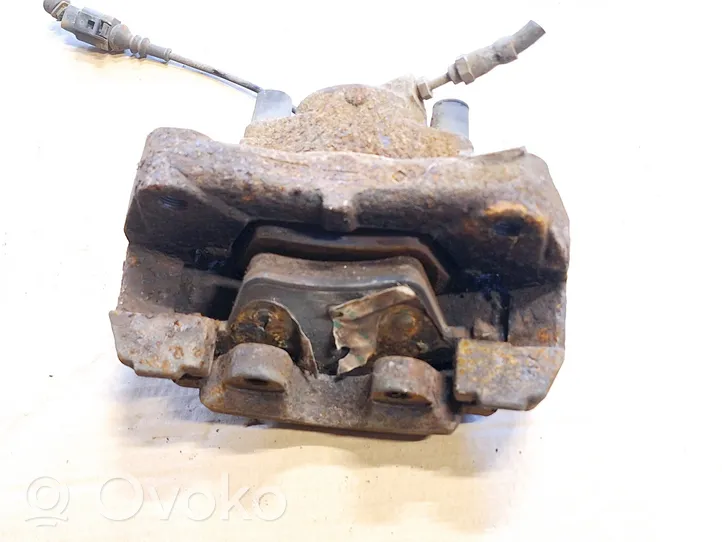 Volkswagen Touareg I Front brake caliper 0