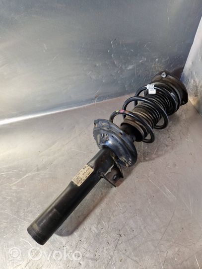 Volkswagen PASSAT B8 Front shock absorber with coil spring 3Q0413031BN