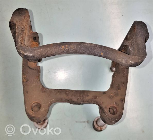 Volkswagen PASSAT B6 Plaquette / support d'étrier avant 92257E