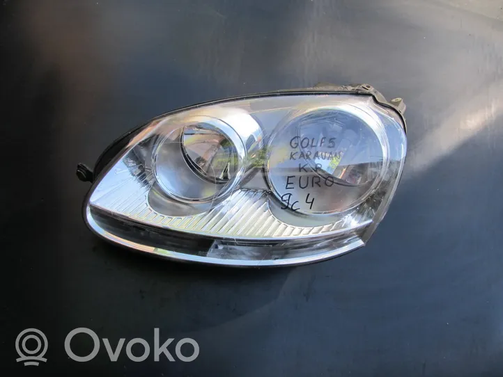 Volkswagen Golf V Lampa przednia 08D411102L