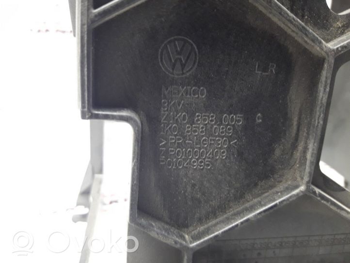 Volkswagen Jetta V Radio/GPS head unit trim 1K0858005C