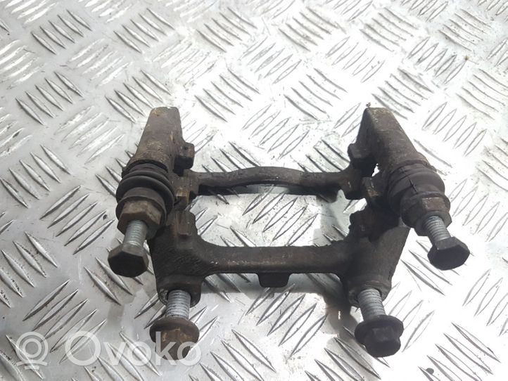 Ford Mondeo MK IV Supporto della pinza del freno posteriore 1487B