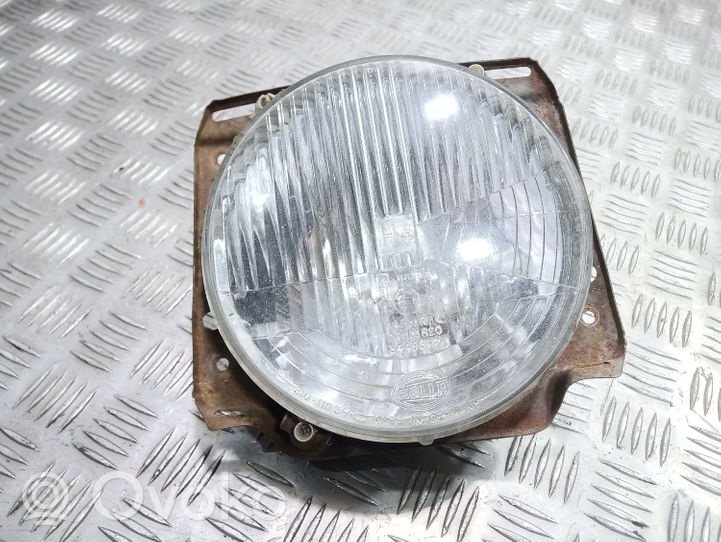 Volkswagen Golf II Lampa przednia 310115367