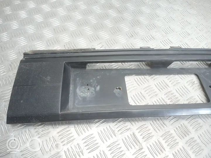 Volkswagen PASSAT B3 Trunk door license plate light bar 357853489